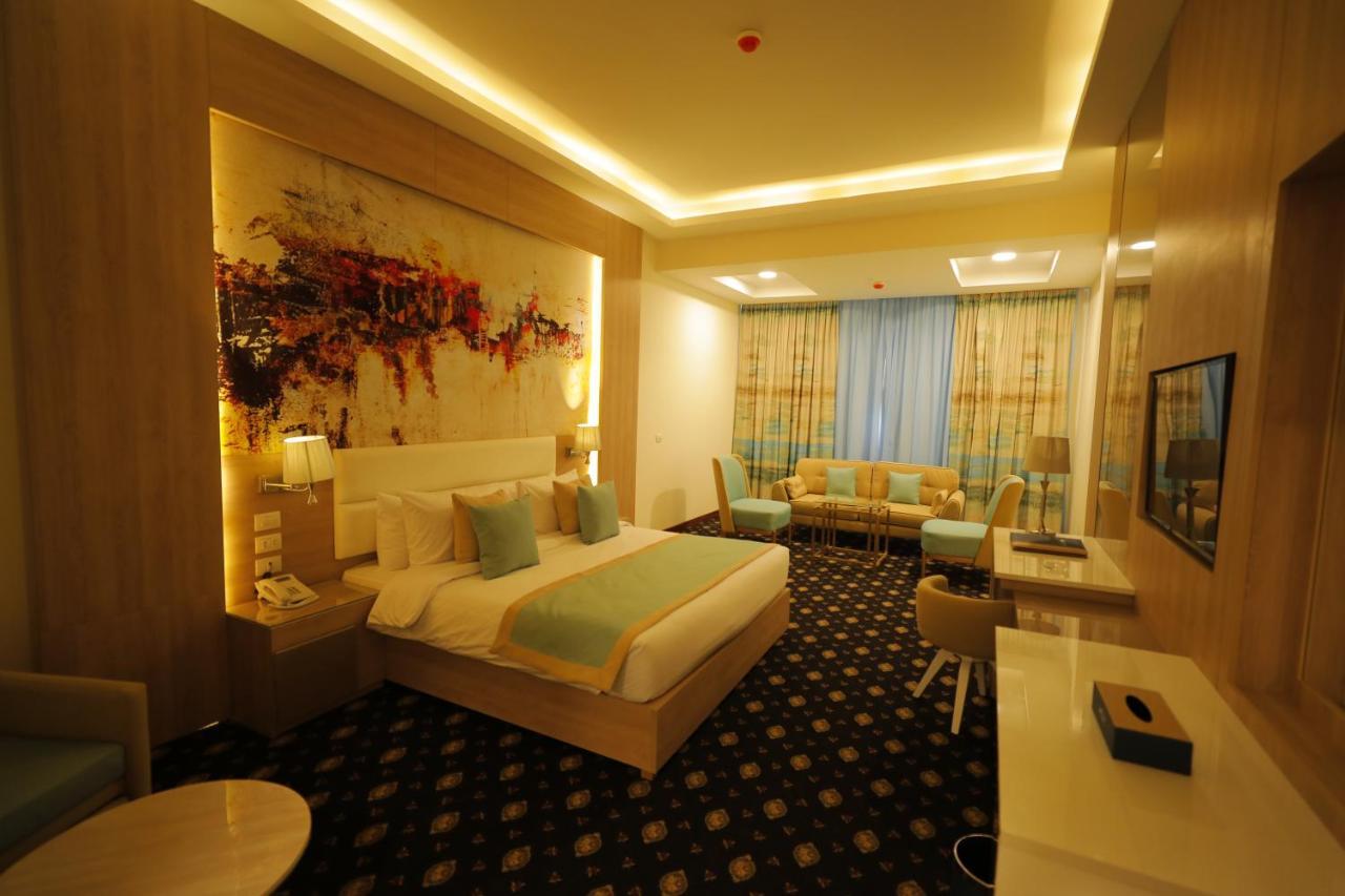 Tolip Gardens Hotel Каир Экстерьер фото A room at the hotel