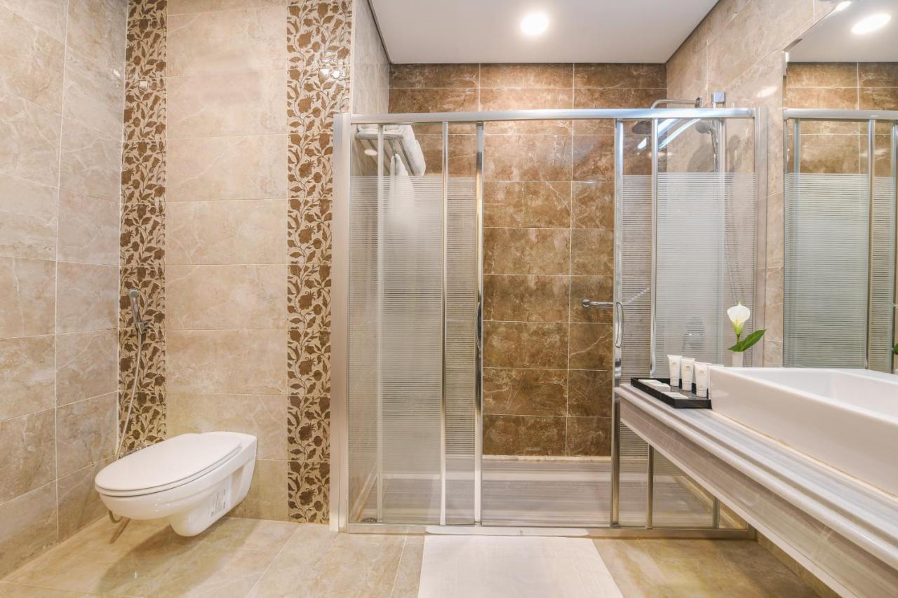 Tolip Gardens Hotel Каир Экстерьер фото A shower enclosure